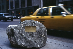 100 limestone boulders with the names of women from the city. (Chicago - downtown circle) - the boulders appeared overnight.